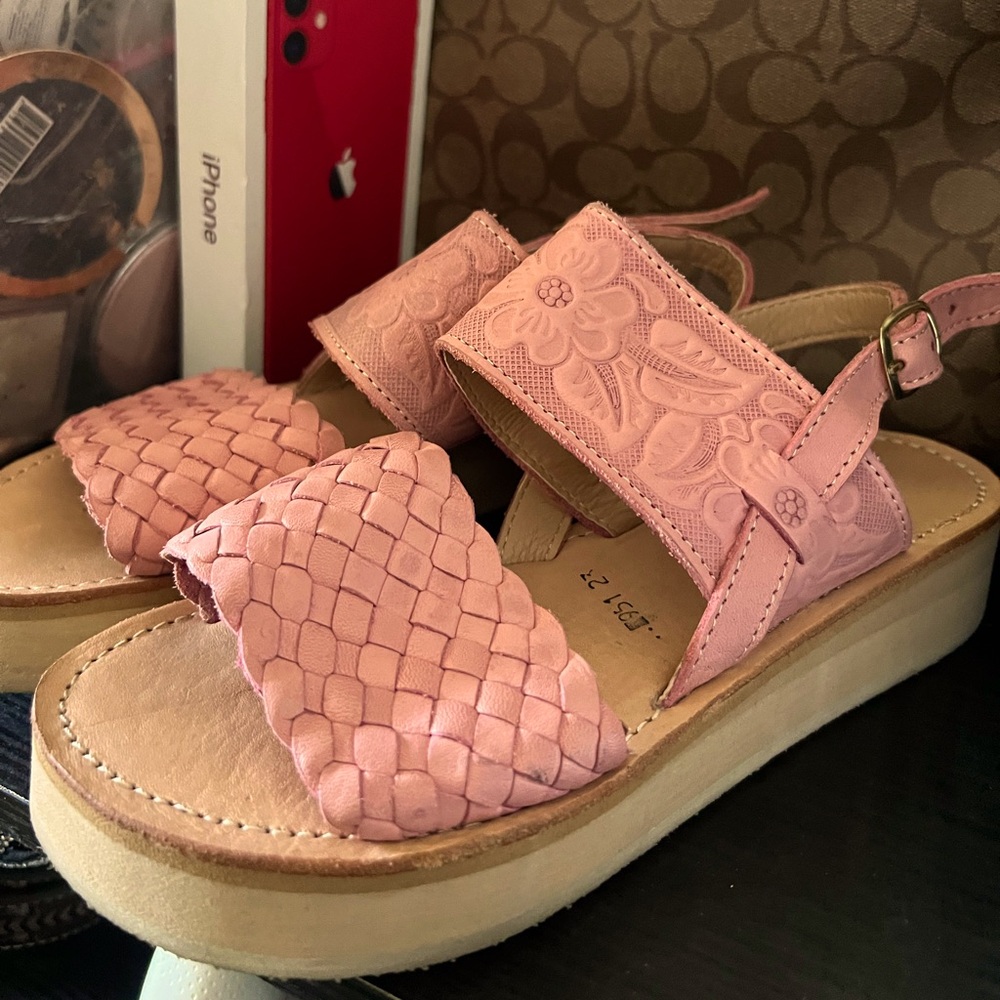 They are fairly new and in really good condition! They are also platform.